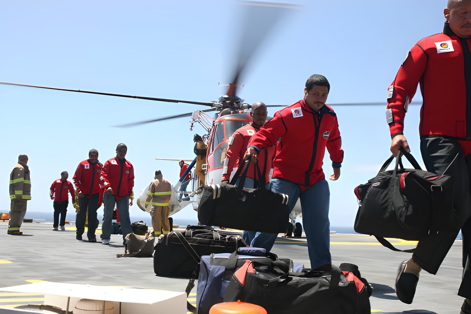 Helicopter transporting crew to an offshore platform